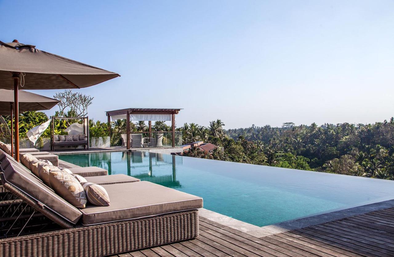 โกยา บูทิก รีสอร์ต Hotel อูบุด ภายนอก รูปภาพ An infinity pool at Alila Ubud, Bali, Indonesia